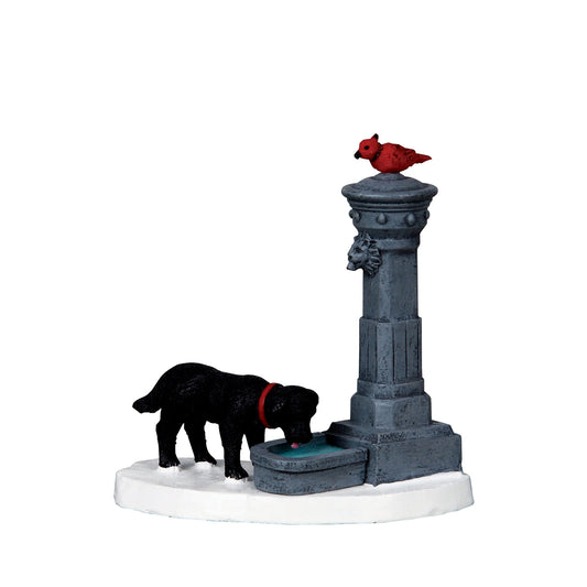 Water Fountain with a Puppy taking a drink